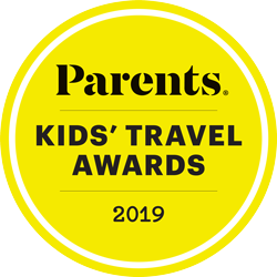 A circular logo in yellow featuring the text 'Parents KIDS' TRAVEL AWARDS 2019', indicating an award related to children's travel.
